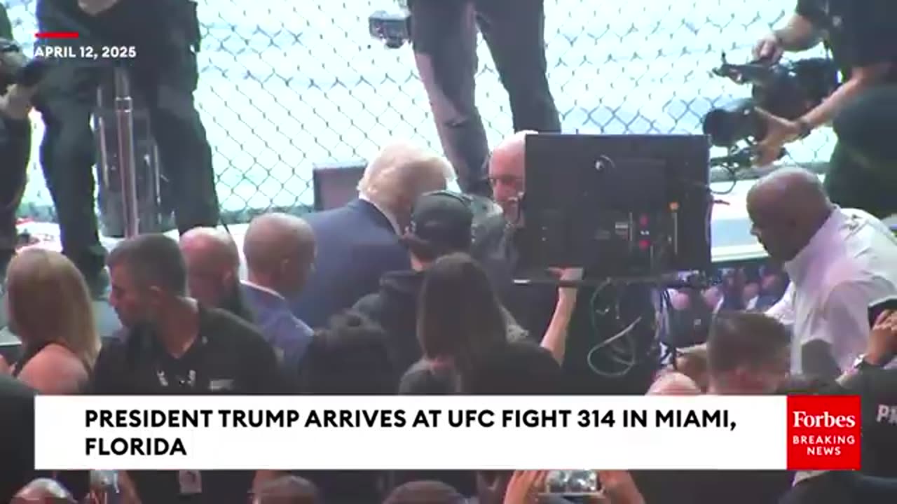 Trump and granddaughter Kai enter the UFC arena, the audience roared