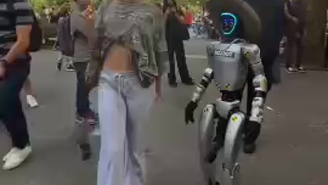 Robot working on his game