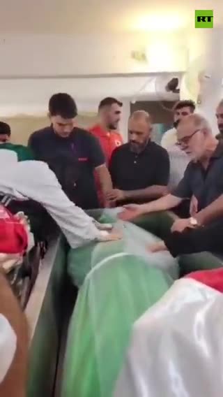 Seriously injured mom holds her dead children one last time