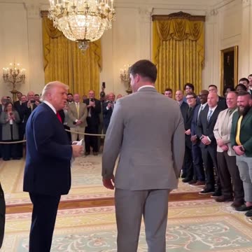 President Donald Trump polls the North Dakota State University football team
