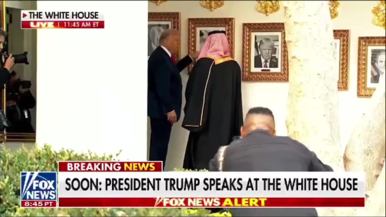 President Trump is showing the Prince the auto pen portrait!