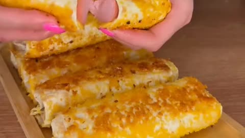 Sausages wrapped with cheese tortilla bread
