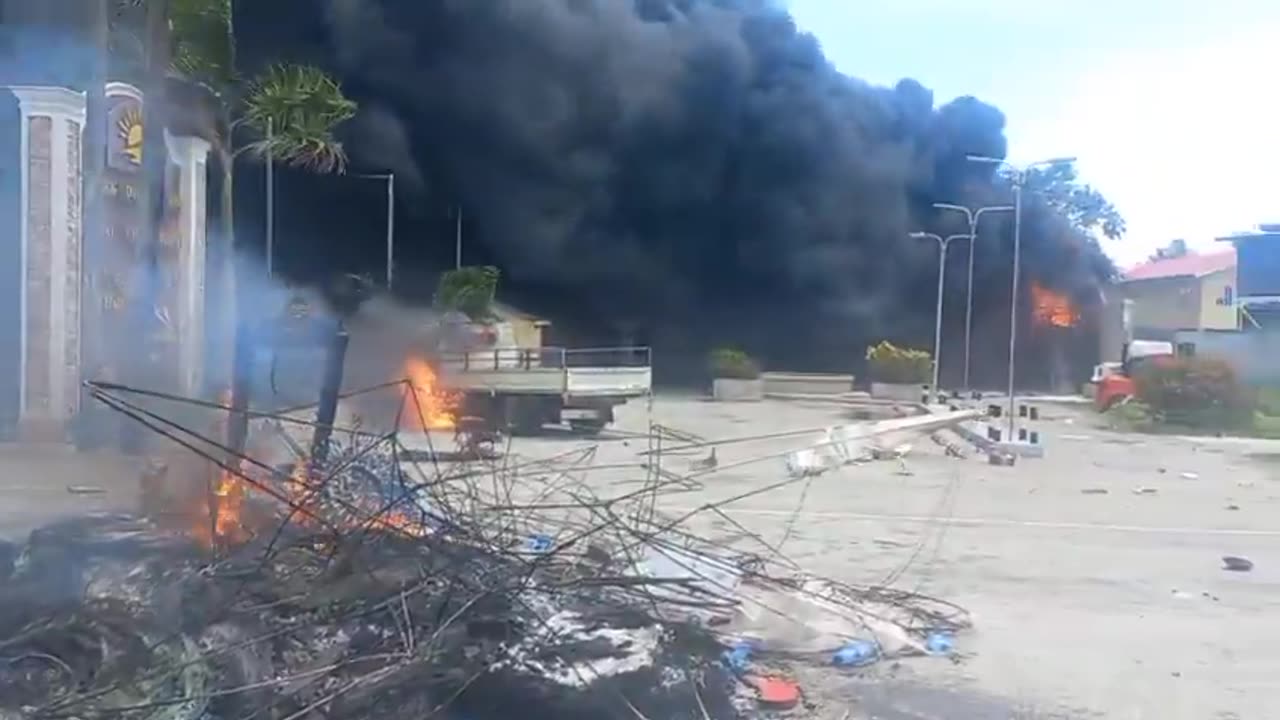 TUSCHEN, GUYANA - Protesters set fire at hotel after child missing since Wednesday