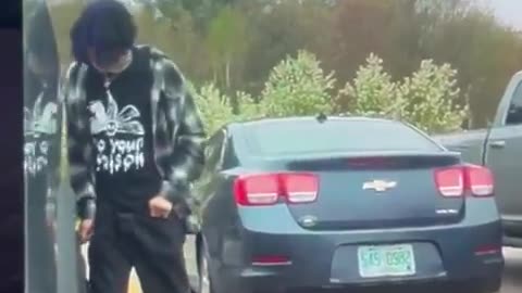Retard slashes a Tesla Cybertruck's tire right in front of its cameras, which