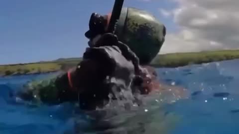 IN RUSSIA AN OCTOPUS NEARLY STRANGLED A DIVER WHEN HE WENT DOWN FOR HIS CATCH
