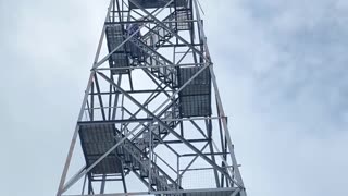 OVERCOMING FEAR: Ola climbing fire tower