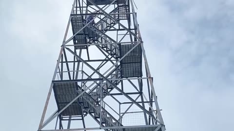 OVERCOMING FEAR: Ola climbing fire tower