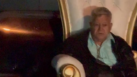 Man Sitting on Truck Bed Throne