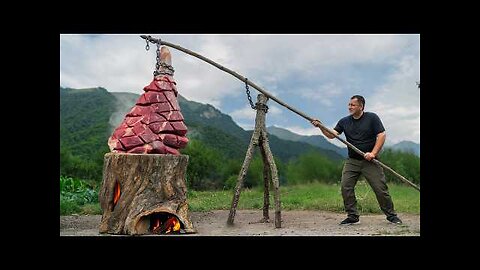 Slow-Cooked Beef Leg Inside a Smoldering Log Over Fire