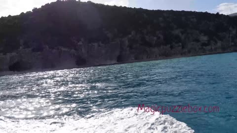 Cala Luna beach view playing chess in the Cave of the Reverse Heart Sardinia Italy