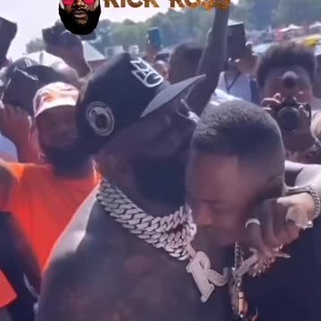 50 Cent is wondering if Rick Ross was hugging up on a man?!
