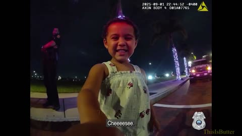 Tampa police officer lets curious girl inspect bodycam