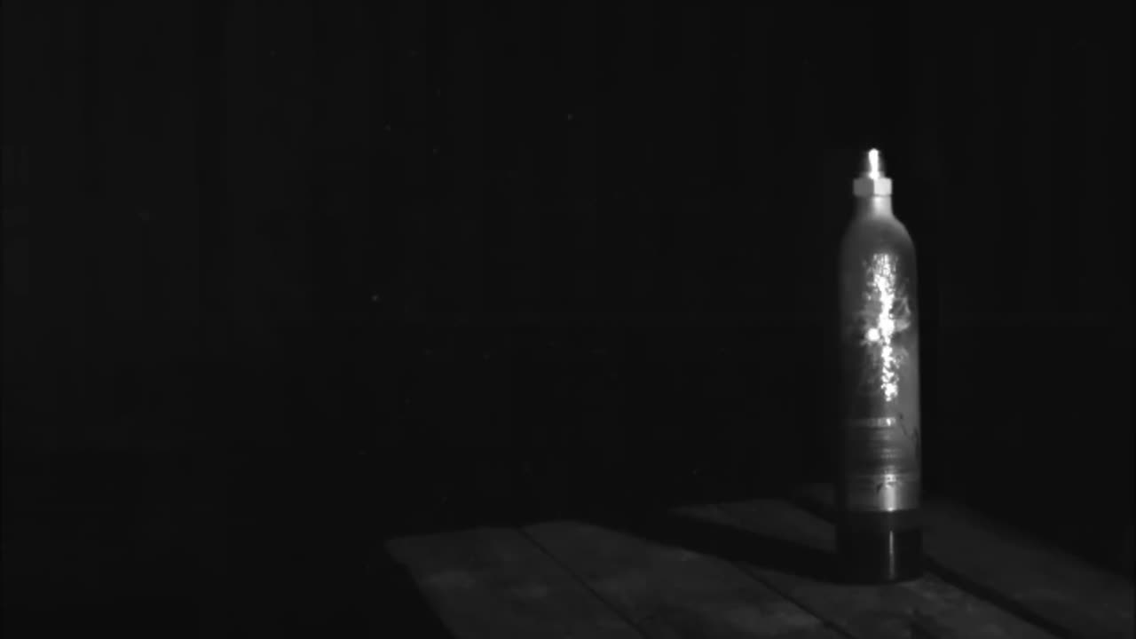 Paintball impacting CO2 tank (Slow Motion)