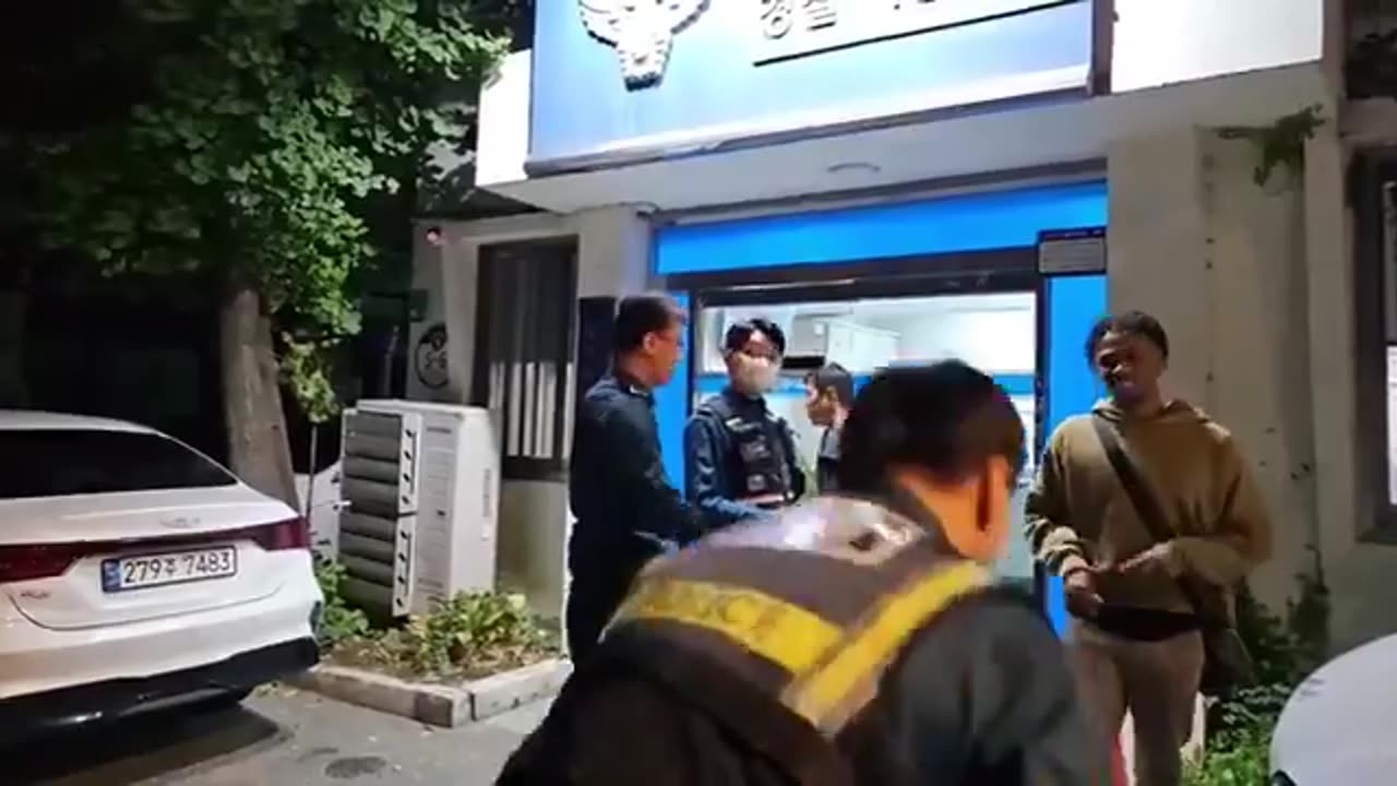 Johnny Somali gets called Ni66er over and over while getting detained by the Korean
