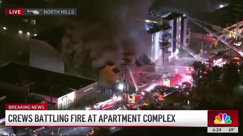 Crews battling fire at apartment complex in LA's North Hills.