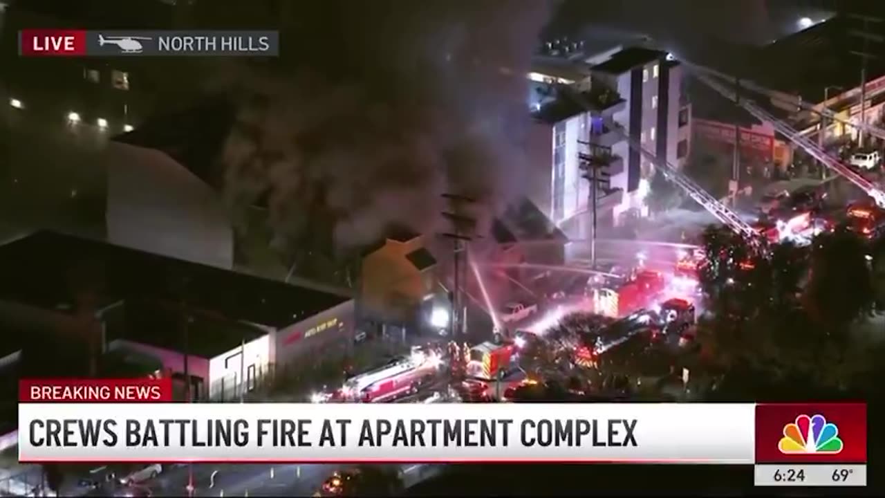 Crews battling fire at apartment complex in LA's North Hills.
