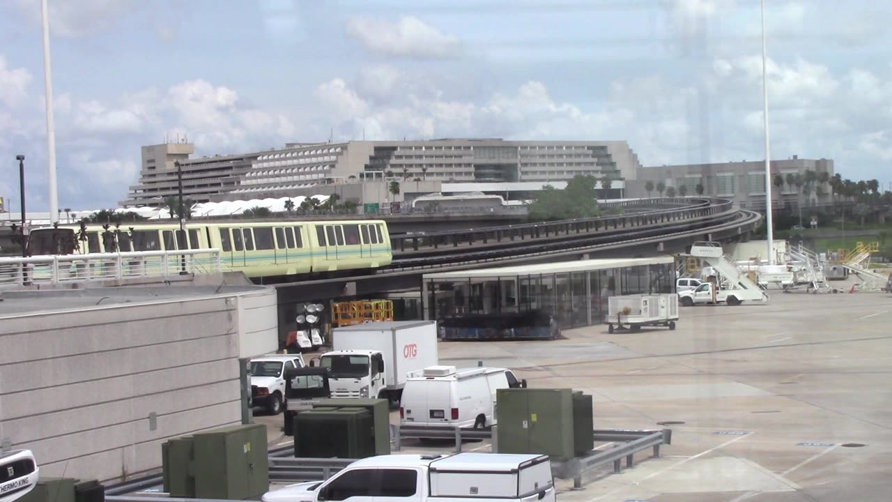 Orlando Airport People Mover Going Into and Out Of the Station