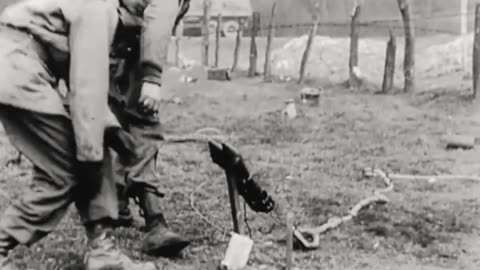 Improvised mine-clearing line charge trials in Germany in March 1945