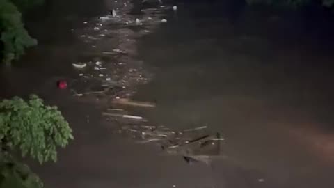 devastating flash flooding in West Virginia as thousands lose power