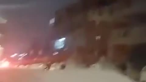 Impact of Iran's rocket assault on central Israel