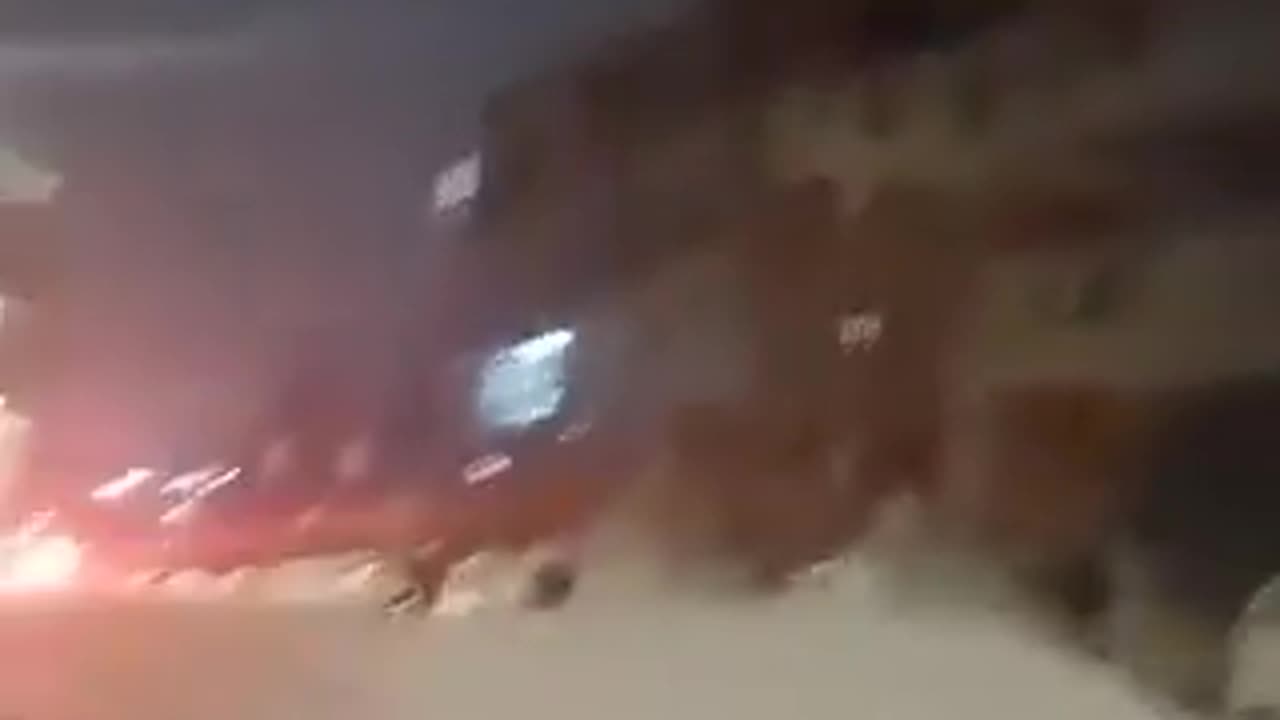 Impact of Iran's rocket assault on central Israel