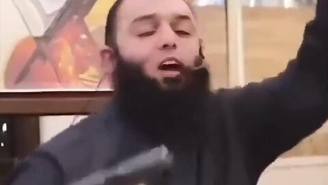 Muslim leader waives his gun inside a mosque and proudly proclaims killing the infidels
