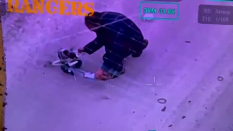 Drunk Guy Dismantling Fallen Drone in Middle of the Road