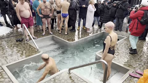 Traditional bathing in cold water in winter at Epiphany. Orthodox holiday on -7C