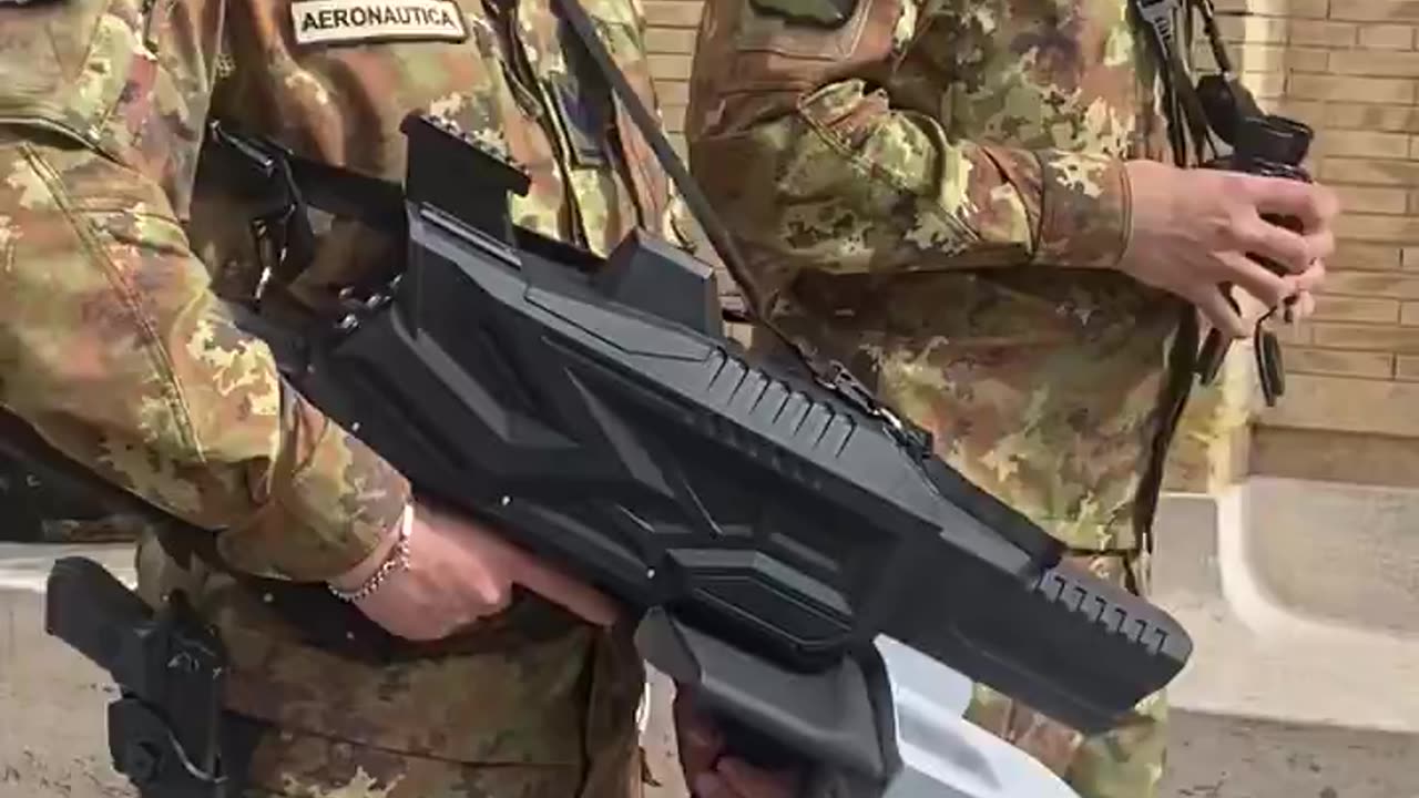 What kind of weapon is the guard at the Pope's funeral armed with?
