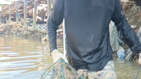 working in the water cleaning ropes