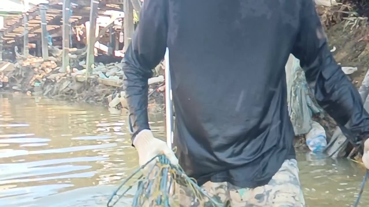 working in the water cleaning ropes