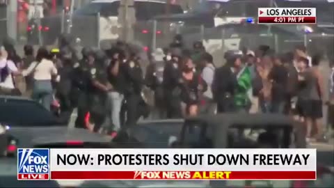 Rioters are blocking the main highway in Los Angeles again