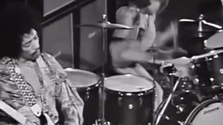 Jimi Hendrix performs a dazzling solo during a show in Stockholm (1969)