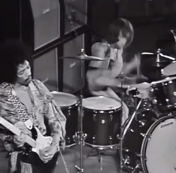 Jimi Hendrix performs a dazzling solo during a show in Stockholm (1969)