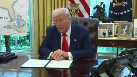 President Donald Trump signs a presidential memorandum stripping "TRAITOR" Miles Taylor