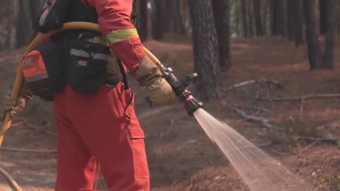 Wildfires send massive plumes of smoke over Spain's mountains