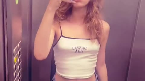Admire beauty tgirl in elevator