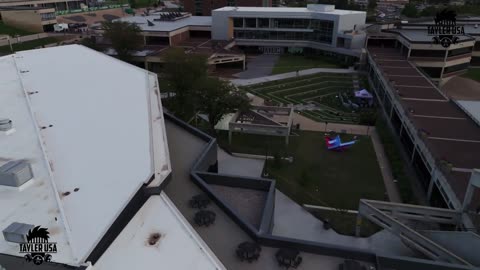 Drone footage shows the Charlie Kirk assassination crime scene at Utah Valley University