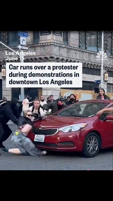 Man drives over protestors blocking the street in Los Angeles. Instant Karma