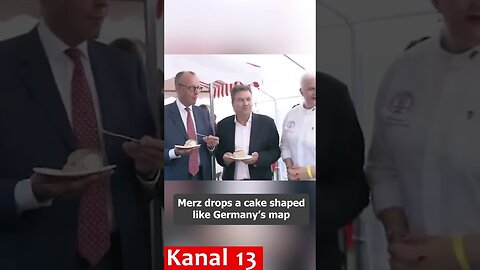 German Chancellor Merz drops a piece of cake shaped like Germany's map at event in Berlin
