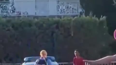 Germany-2025 a migrant smashes a police car and the officers just stand and watch