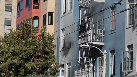 SFFD Rescue Man From Burning Building