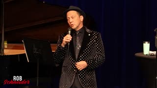 Rob Schneider sings the Chaplin classic "Smile"