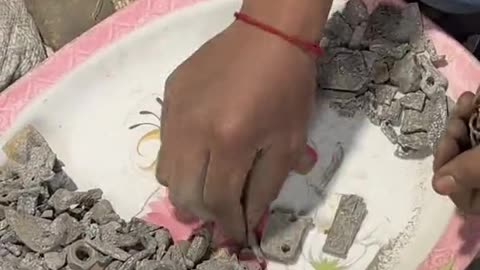Metal and Silver Picking and recycling from stones