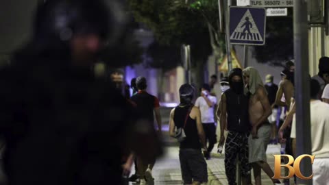 Police detain 8 people after anti-migrant clashes in Spanish town