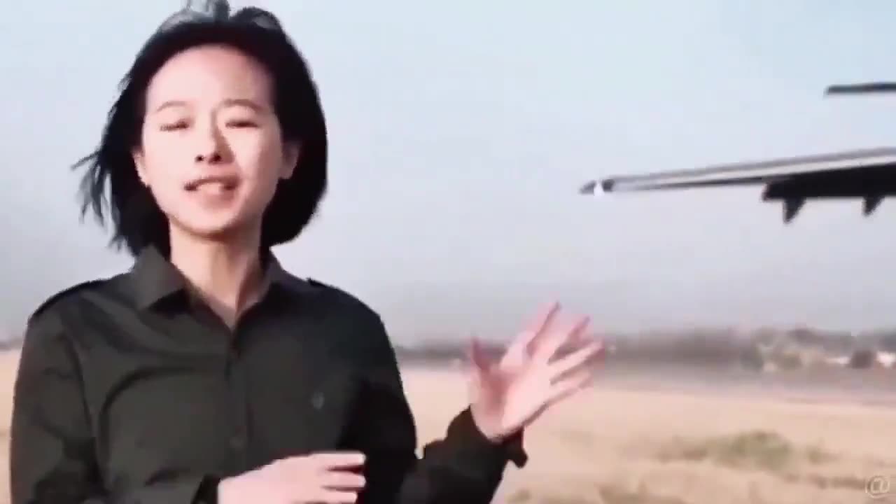 China’s cute military correspondent constantly faces danger, even running from a minefield.