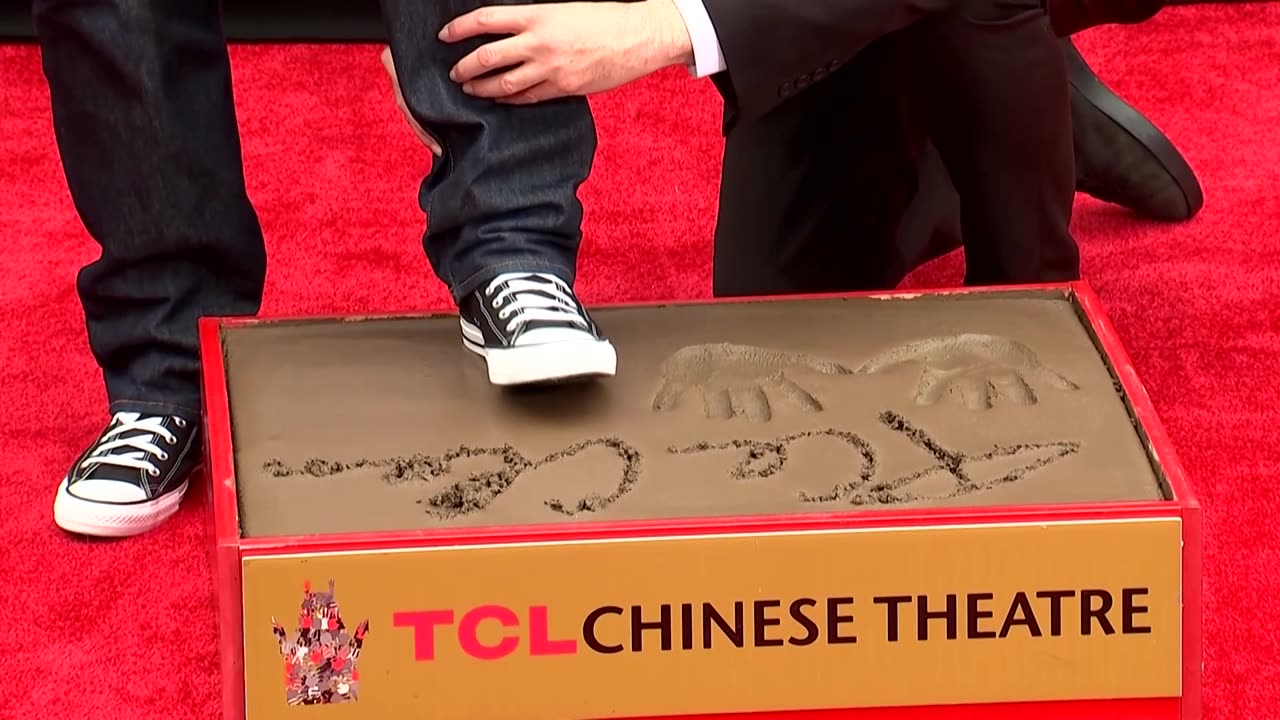 Rapper Ice Cube honored with hands and feet ceremony