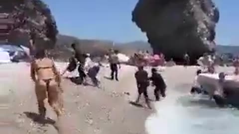 Fake asylum seekers invade topless beach in Spain.