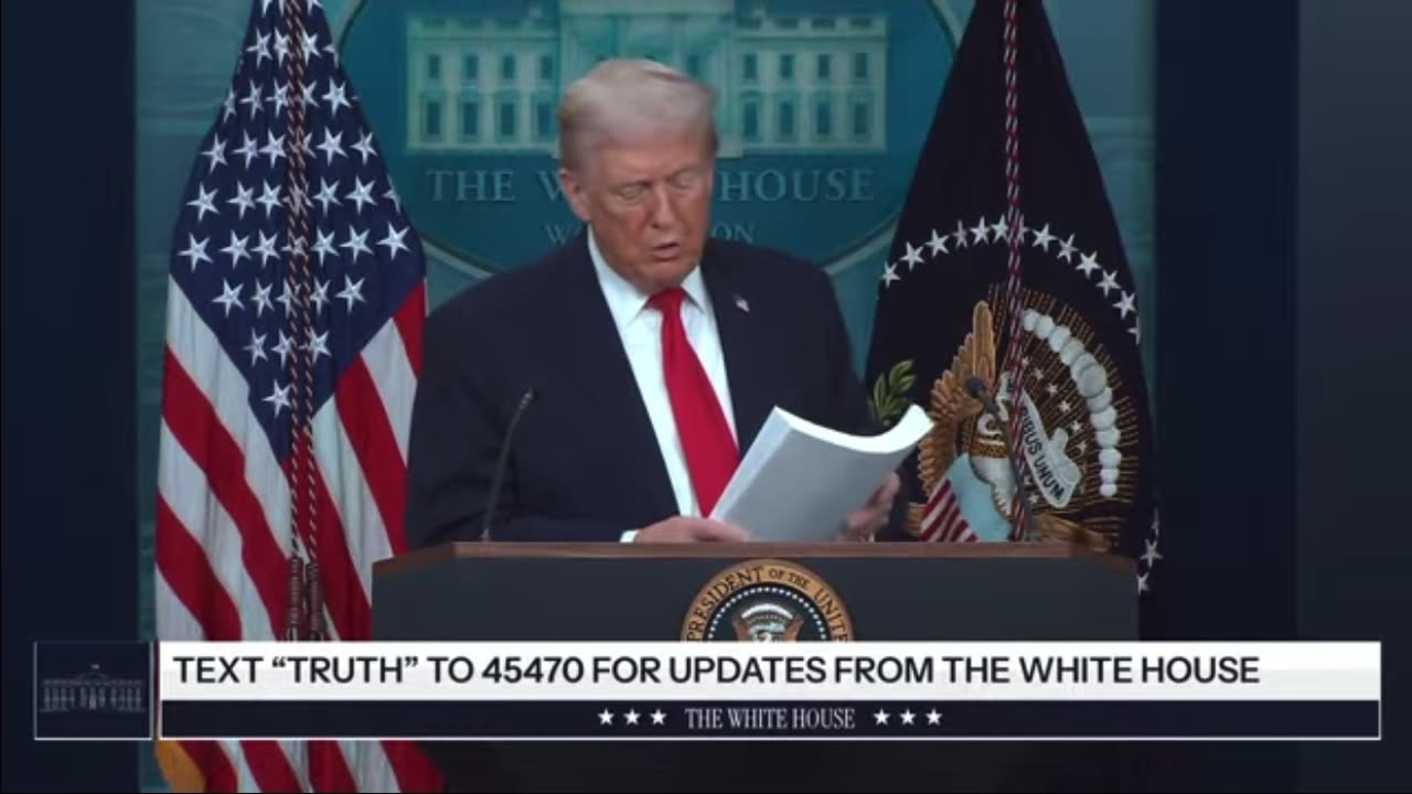 Trump shows inches thick stack of papers highlighting accomplishments