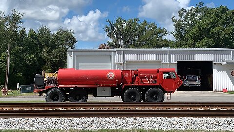 Serious Firefighting Vehicle next to the tracks
